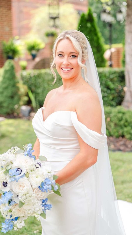 Full-length view of a stunning bride with professional hair and makeup – BRIDEface Richmond